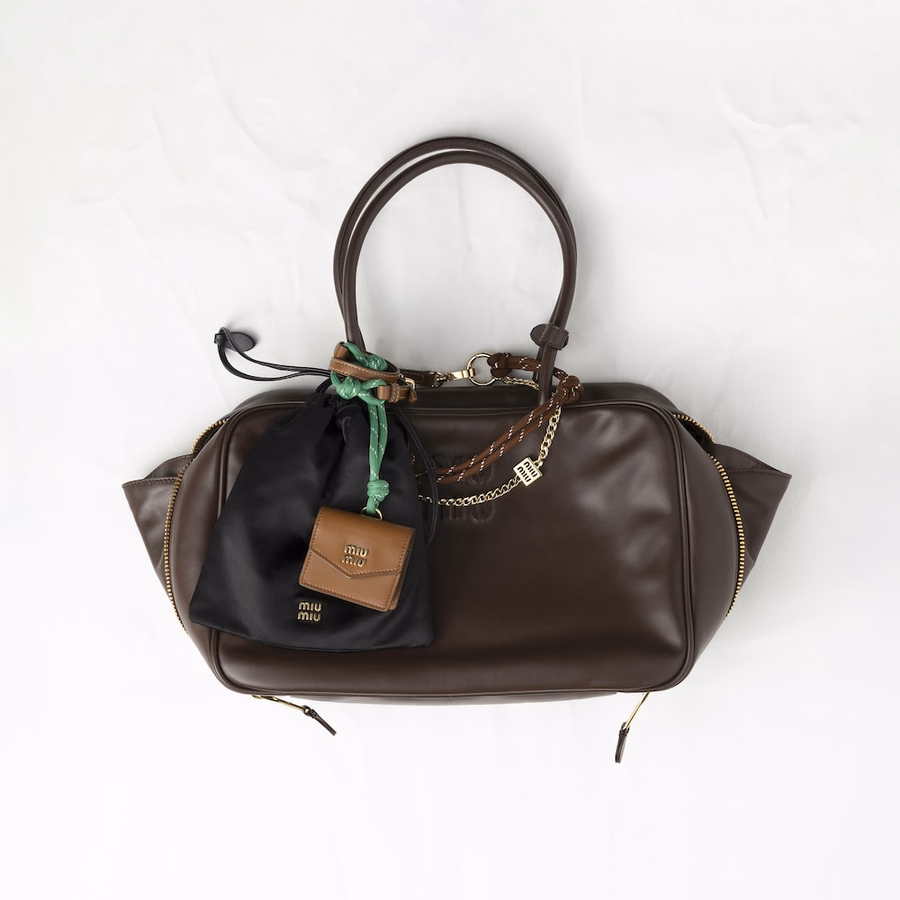 Leather, cord and metal trick keyring