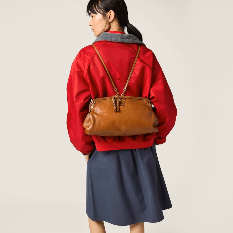 Caprice leather clutch