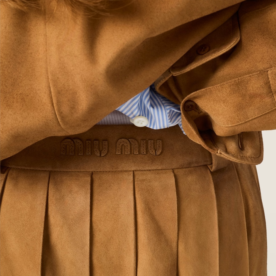 Pleated waxed suede mini-skirt